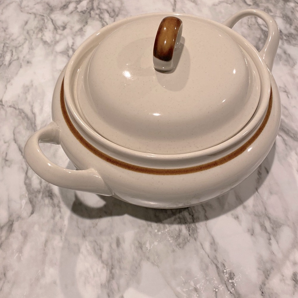 Mountain wood stoneware. Oven to table, dishwasher and microwave safe.